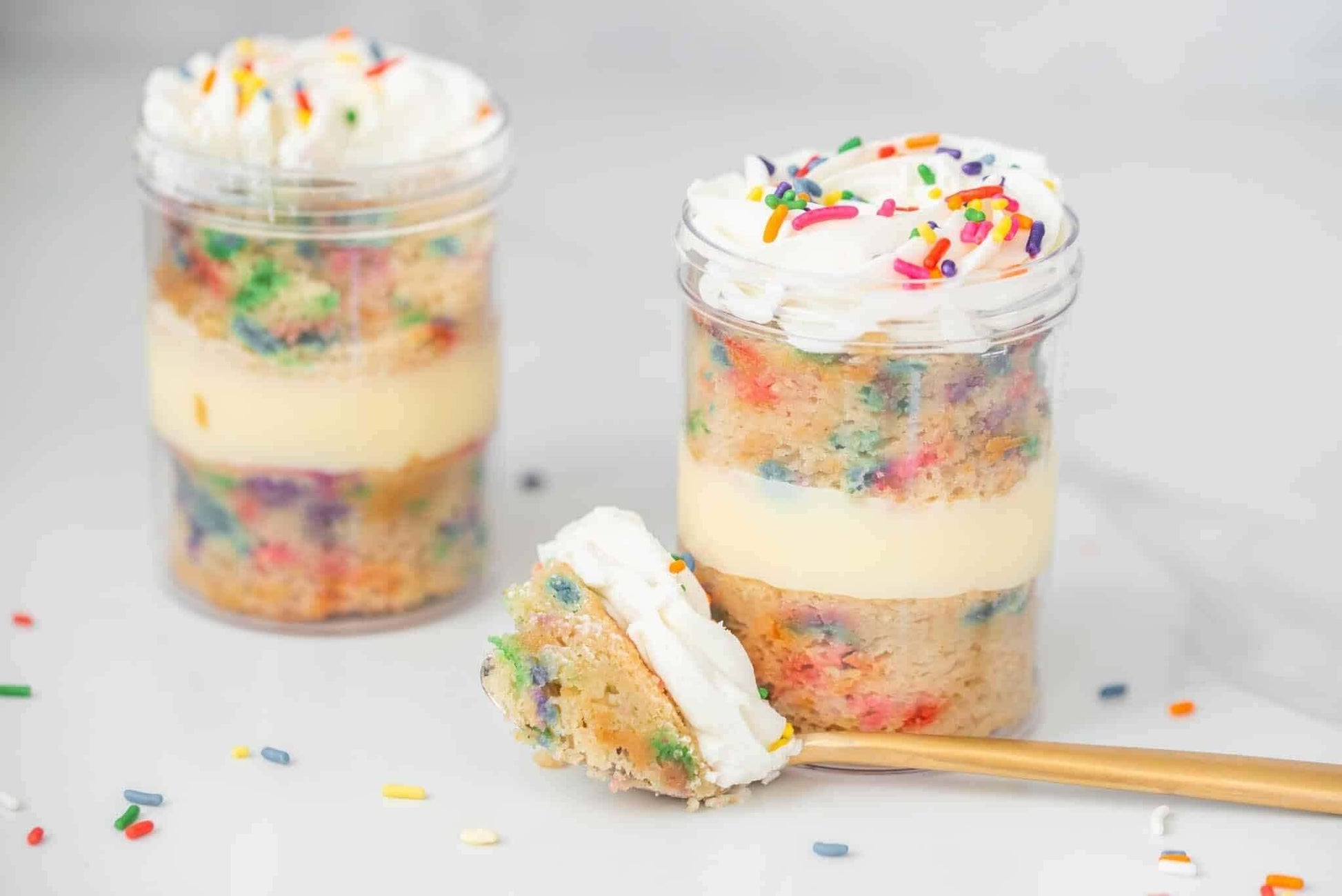 Vegan Gluten-Free Confetti Cream Cake In A Jar Allergen-friendly desserts Allergy free Artisan vegan bakery baked goods Bakeries near me Bakery Best bakery near me Best gluten-free cake Best vegan cake Birthday cakes near me Cake bakery near me Cake deliv